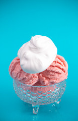 Strawberry Ice Cream Sundae on a Bright Blue Background