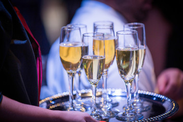 glasses of champagne on serving tray
