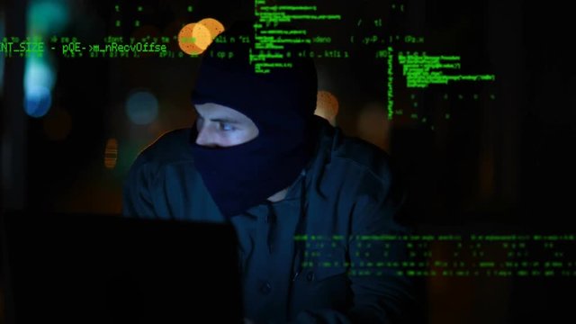 Hacker using a laptop
