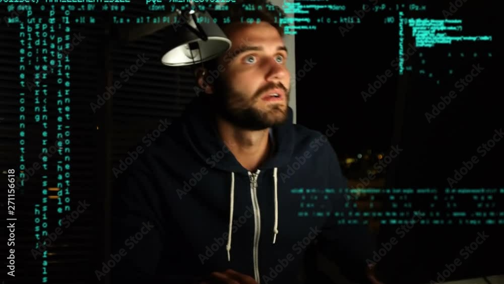 Poster hacker using a computer and program codes