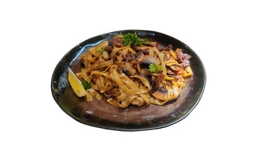 dish of chinese cuisine. noodles with champignons and beef