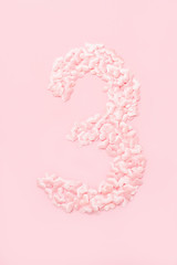 Number three collected from decorative pink hearts. Isolated on pink background