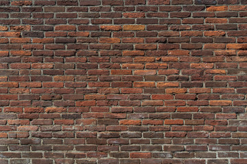 Real vintage Bumpy, rough and old brick texture with imperfect, dilapidate, impair and defective running bond pattern. 