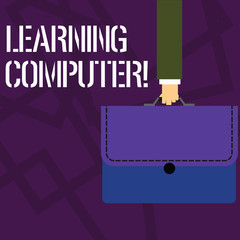 Text sign showing Learning Computer. Business photo showcasing learn more about each of the components in the computer Businessman Hand Carrying Colorful Briefcase Portfolio with Stitch Applique