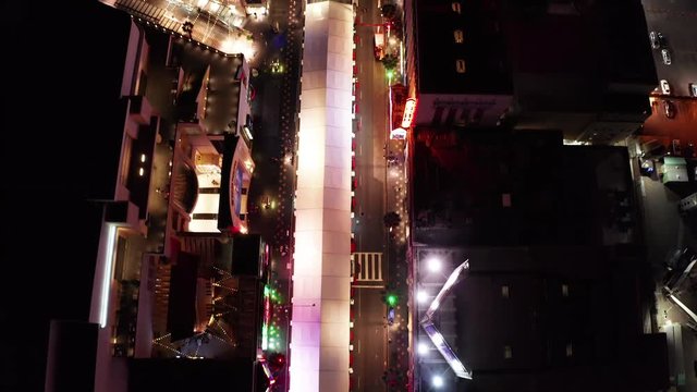 Aerial view above famous Hollywood Boulevard in Los Angeles, California on the evening of a new movie or film premiere.