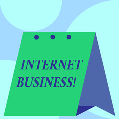 Text sign showing Internet Business. Business photo showcasing business or commercial transactions that take place online Open big standing calendar Desk monthly planner Geometrical background