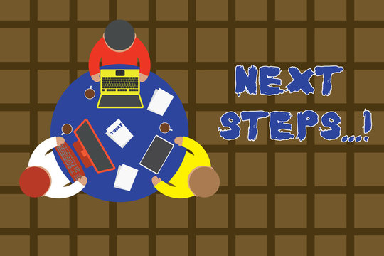Word writing text Next Steps. Business photo showcasing something you do after you have finished doing first one Working round table male employees electronic devices documents coffee cup