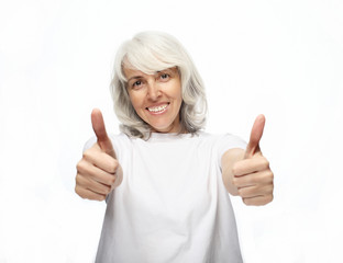 lifestyle and people concept: Old happy woman showing ok sign