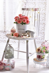 bunch of pink roses in shabby chic style interior