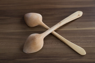 the handmade wooden spoon on the table for food photography concept.