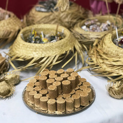 Table of typical food of junina party: paçoca candy, lollipops, cake, dulce de leche, peanut candy. Tradicional Festa Junina Party Brazilian Culture Concept Image.