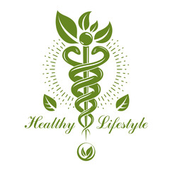 Caduceus vector conceptual emblem created with snakes and green leaves. Wellness and harmony metaphor. Alternative medicine concept, phytotherapy logo.