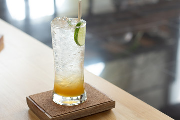 Mock tail Honey lemon soda on wood table. 