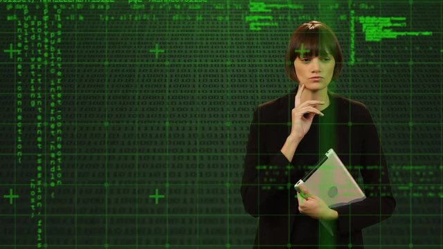 Woman holding a tablet and touching screen