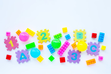 Colorful Kids toys on white background.