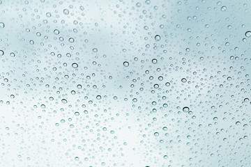 Raindrops on window glasses surface , Natural Pattern of raindrops.
