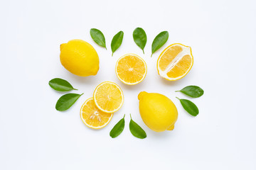 lemon and slices with leaves isolated on white.