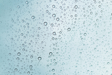 Raindrops on window glasses surface , Natural Pattern of raindrops.