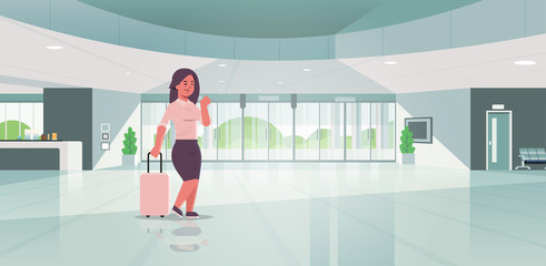 businesswoman with luggage modern reception area business woman holding suitcase girl standing in lobby contemporary hotel hall interior flat horizontal full length