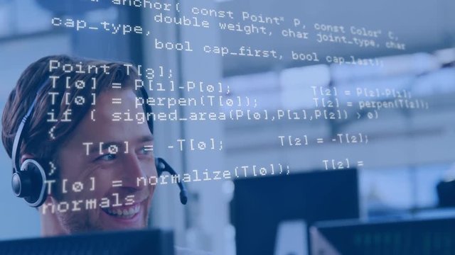 Man talking with headset using a computer 