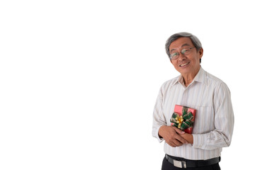 Old senior Asian man in white shirt holding a box of present looking happy and loved, on isolated white background.