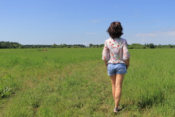 Fototapeta premium woman among the field