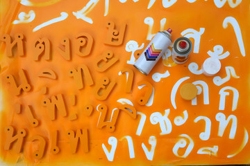 Thai Alphabets with Spray Paint , Pieces of letters were cut.