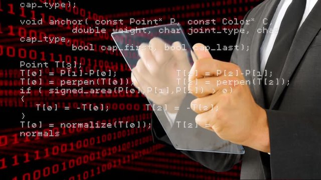 Businessman using a futuristic digital tablet
