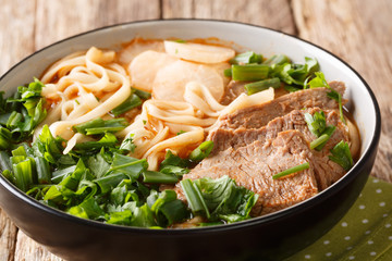 Easy Recipe for Lanzhou Beef Noodle Soup closeup in a bowl. horizontal