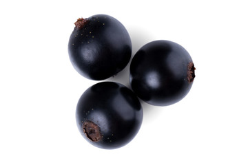 Ripe blackcurrant isolated on a white background. Black berries. Delicious and healthy food. Top view