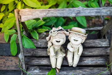 Terracotta doll,  in the garden