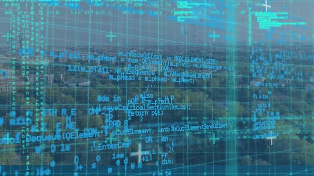 Program codes and aerial view of a city