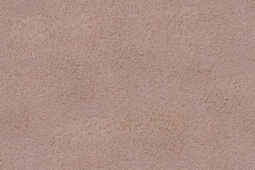 Abstract light brown cement wall textured background, seamless tiling texture