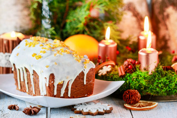 Christmas gingerbread cake among traditional decorations.