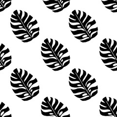 Abstract pattern with black leaves of monstera on a white background