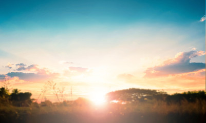 Fototapeta na wymiar World environment day concept: Sun light and abstract blurred autumn sunrise background