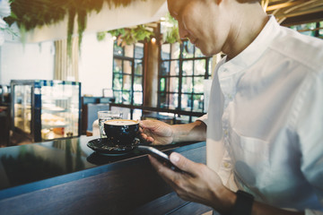 businessman working on negotiation to sign contract with partners at coffee cafe