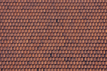 aged red tile roof, texture or background