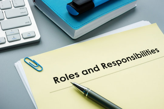 Roles And Responsibilities documents in the office.