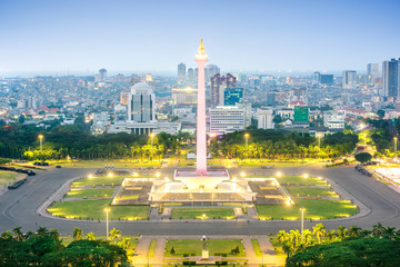 Jakarta city skyline with iconic symbol likes National Monument (Monas) at night © Leo Lintang