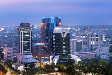 Naklejka premium Jakarta city skyline with urban skyscrapers at night