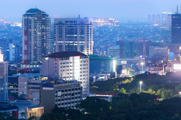 Jakarta city skyline with urban skyscrapers at night