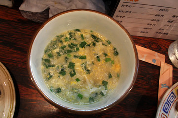 Japanese hodgepodge hotchpotch with rice and egg served at traditional izakaya