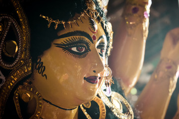 Close up side view face of Goddess Maa Durga Idol. A symbol of strength and power as per Hinduism....