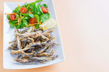Fried sardines (fish) pescaito frito typical spanish tapa