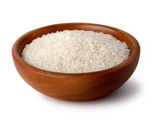 Wooden bowl with white rice. Natural products, healthy food.