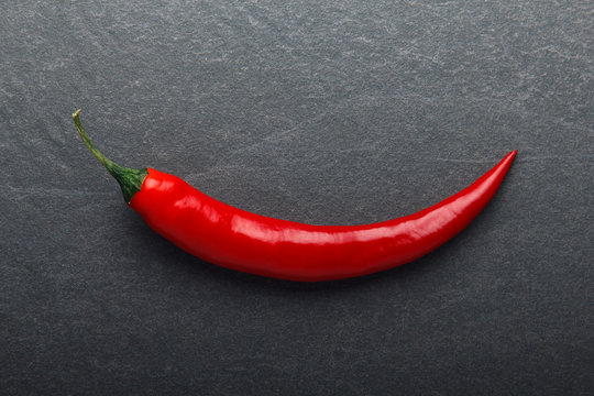 Red Chili Pepper On Black Background