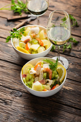 salad with seafood, potato and celery