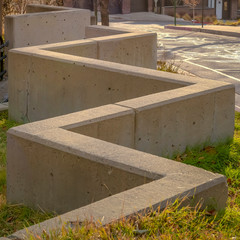 Square frame Outdoor stairs connected to a zig zag concrete barrier in Salt Lake City