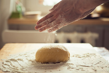 baker kneading dough